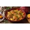 Braised Chicken and Rice with Cardamom, Cranberry, and Orange
