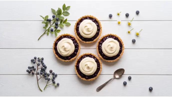 Wild Blueberry and Saskatoon Berry Honeycomb Tarts with Chamomile Mascarpone Cream